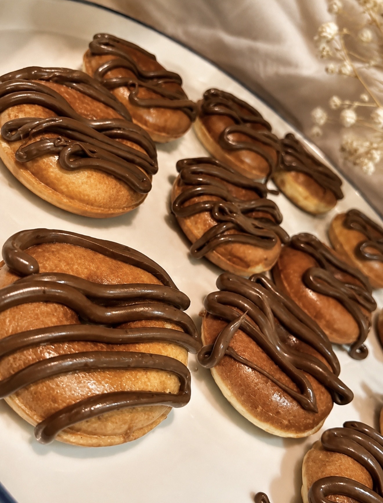 Mini donas de Caracola con topping de chocolate